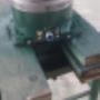 Lineárny elektromotor s magnetickým otočným stolom, vodou chladený po oprave