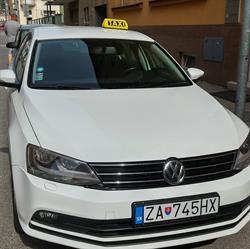 TOMI TAXI